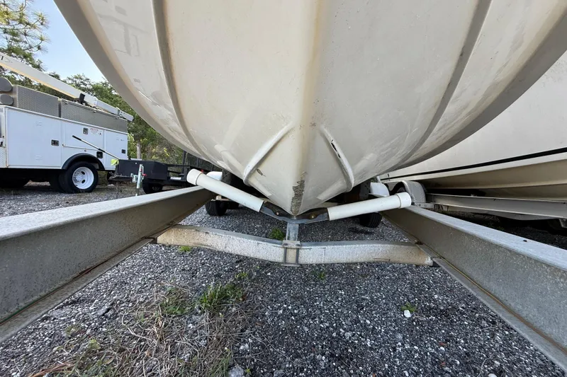 Slide: The Image of 2000 Sport-Craft 241 Walk Around boat on trailer, viewed from below. - 35