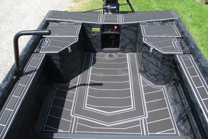 Slide: The Image of 2026 Gator Tail 1854 Extreme boat interior with custom flooring and storage compartments. - 10