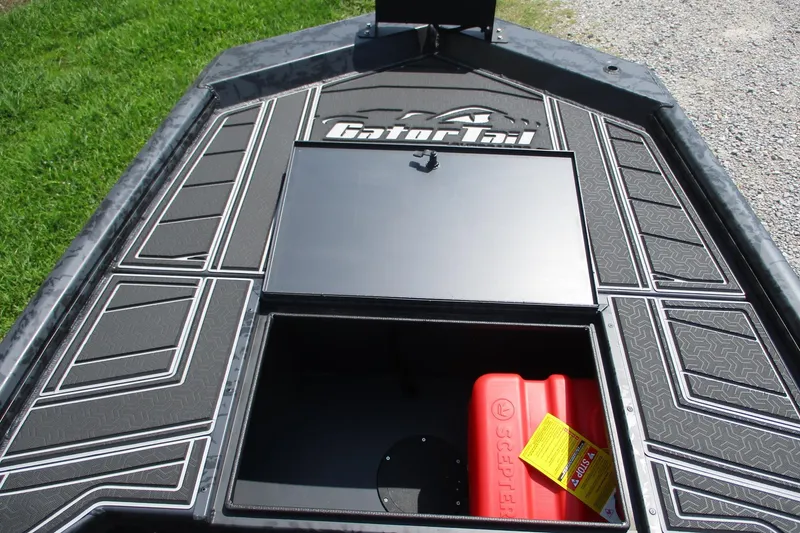Slide: The Image of 2026 Gator Tail 1854 Extreme boat deck with storage compartment and red fuel container. - 4
