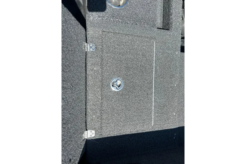 Slide: The Image of Carpeted storage compartment on 2021 Lund 2075 Pro-V Limited boat. - 11
