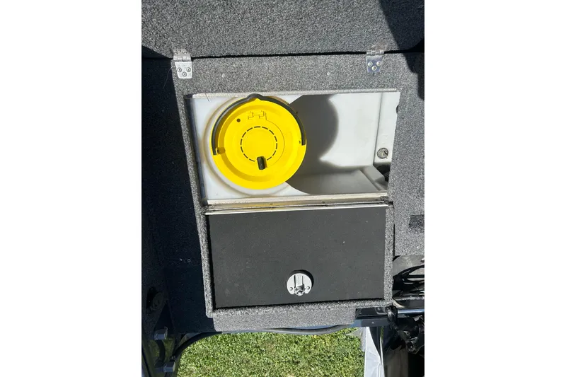 Slide: The Image of Storage compartment with yellow lid in 2021 Lund 2075 Pro-V Limited boat. - 12
