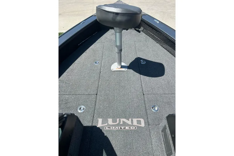 Slide: The Image of 2021 Lund 2075 Pro-V Limited boat deck with seat and logo. - 24