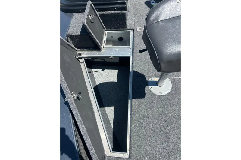 Slide: The Image of 2021 Lund 2075 Pro-V Limited boat interior storage compartment with seat. - 26
