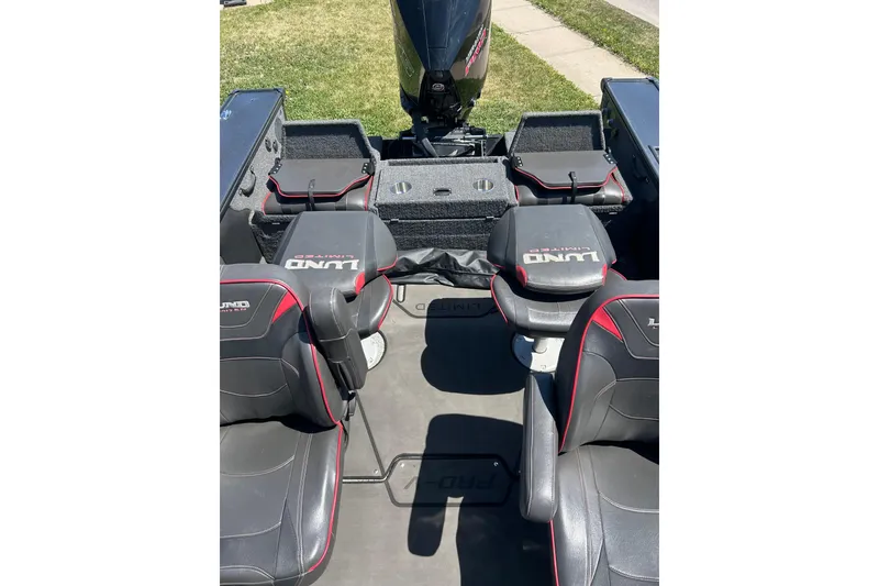 Slide: The Image of 2021 Lund 2075 Pro-V Limited boat interior with seating and storage compartments. - 28