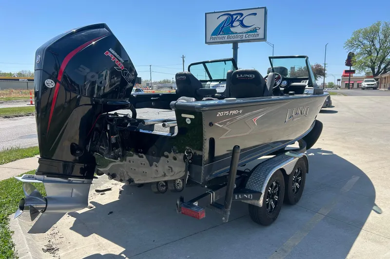 Slide: The Image of 2021 Lund 2075 Pro-V Limited boat with Mercury engine at Premier Boating Center. - 6