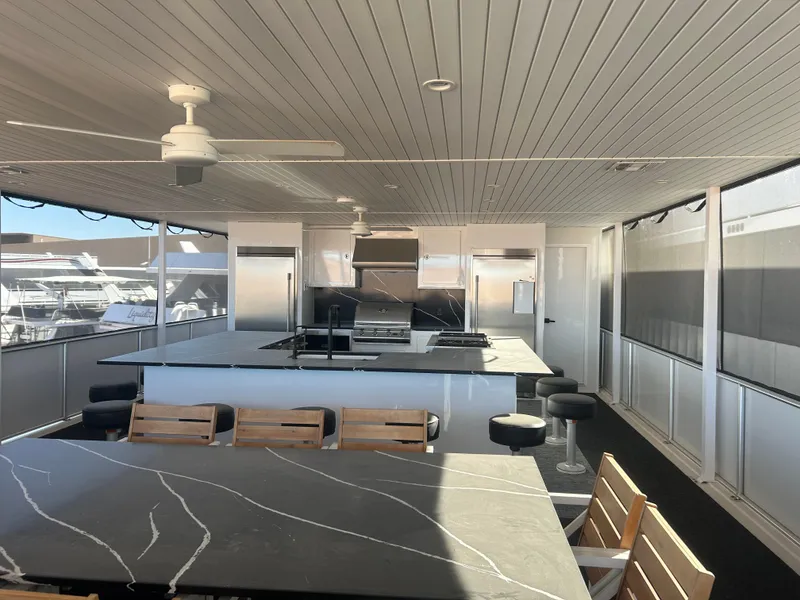 Slide: The Image of Luxurious kitchen area on Adonia Ovation Shared Ownership Trip 5, 2023 model, featuring modern appliances. - 11