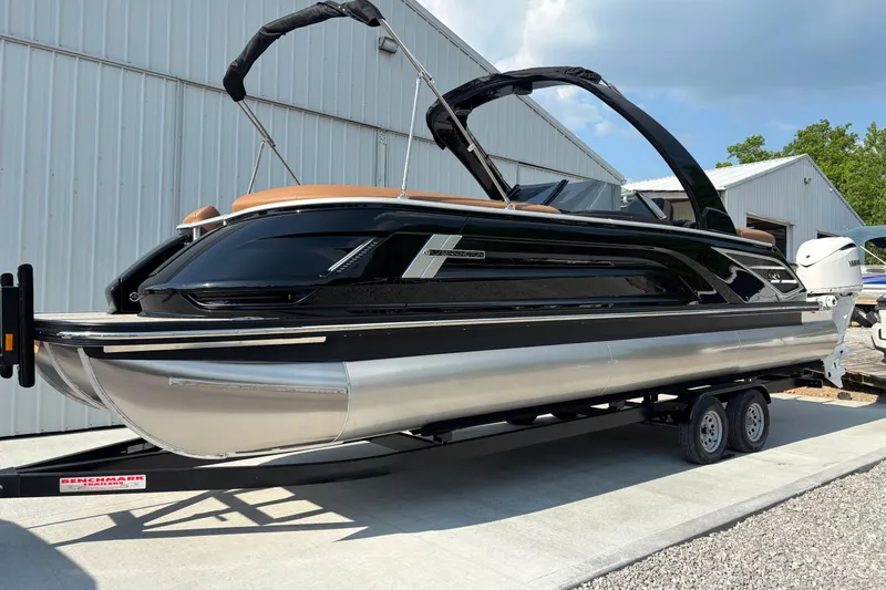 The Image of 2026 Bennington 27 QXFBWA T2 pontoon boat on trailer. - 1