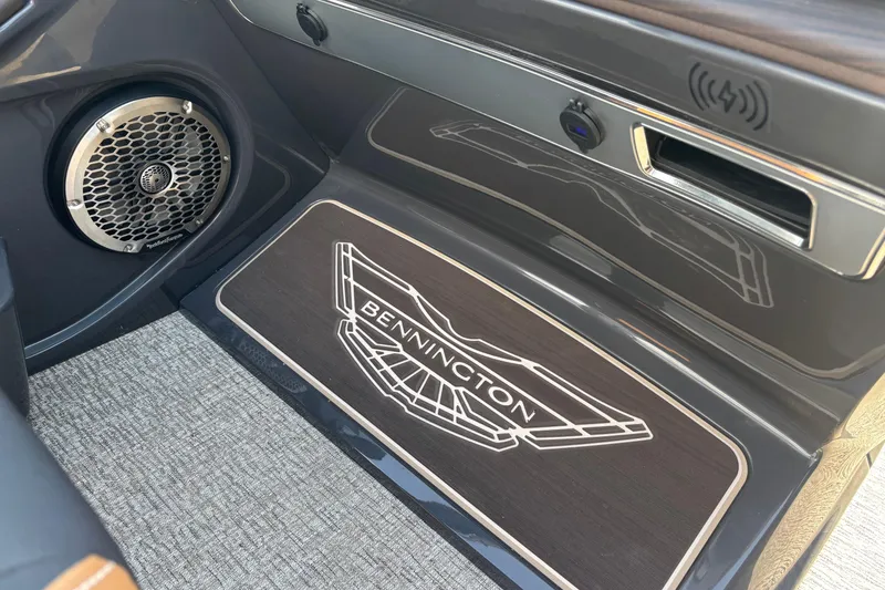 Slide: The Image of Interior of 2026 Bennington 27 QXFBWA T2 with speaker and logo. - 21