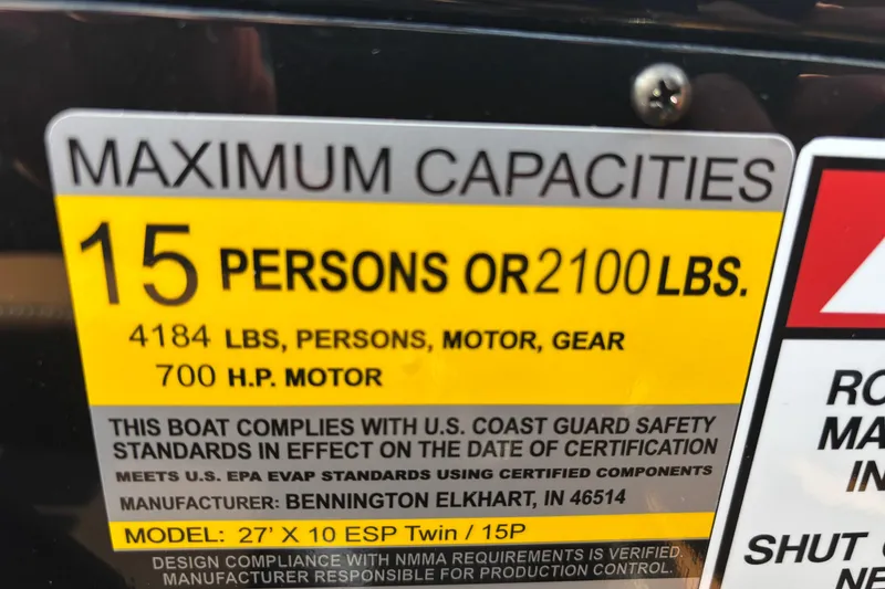 Slide: The Image of Bennington 27 QXFBWA T2 boat capacity label, 15 persons or 2100 lbs. - 22