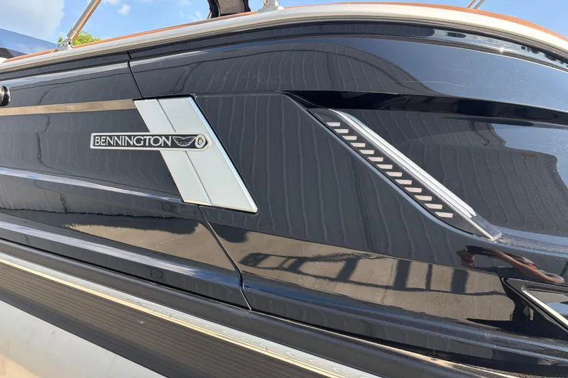 Slide: The Image of 2026 Bennington 27 QXFBWA T2 boat, close-up of logo. - 26
