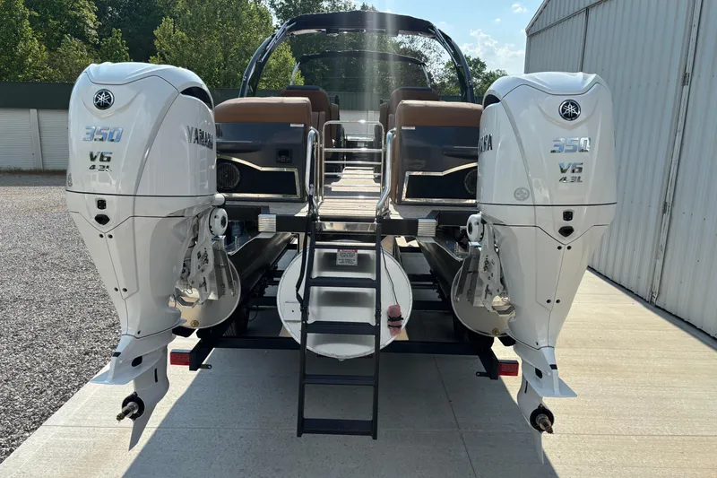 Slide: The Image of 2026 Bennington 27 QXFBWA T2 with dual Yamaha 350 V6 engines. - 4