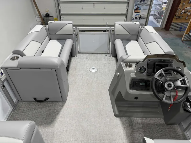 Slide: The Image of Interior of 2026 Avalon VNT VRB21 with gray seating and helm console. - 13