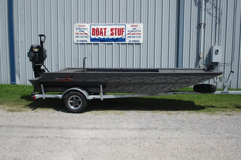 The Image of 2026 Gator Tail 1754 Extreme boat on trailer outside dealership. - 0