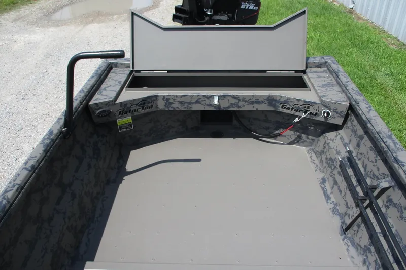 Slide: The Image of 2026 Gator Tail 1754 Extreme boat interior with camo design and storage compartment. - 8
