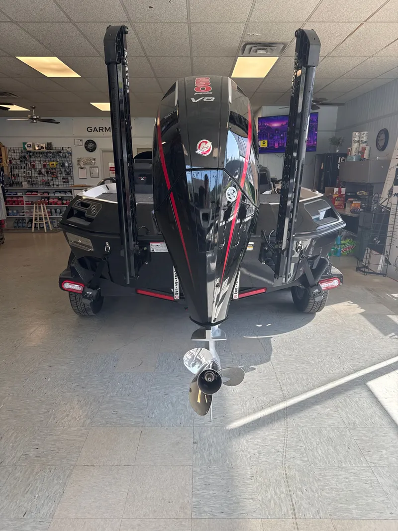 Slide: The Image of Vexus VXs21 2025 boat in showroom, rear view. - 10