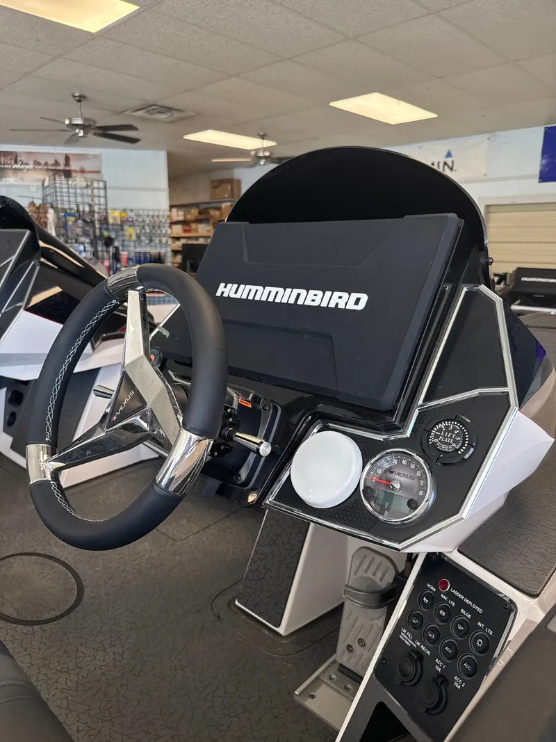 Slide: The Image of Vexus VXs21 2025 boat console with Humminbird display. - 14