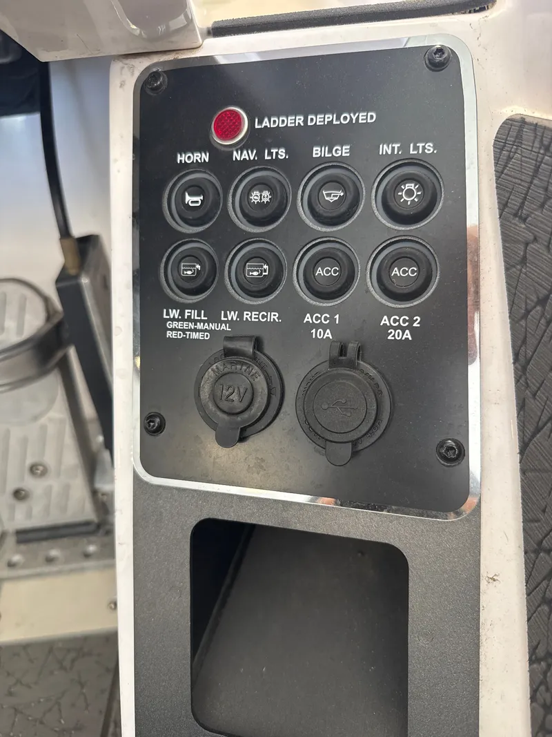 Slide: The Image of Control panel of Vexus VXs21 2025 with switches and sockets. - 15