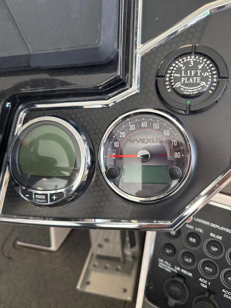 Slide: The Image of Dashboard of 2025 Vexus VXs21 with speedometer and lift plate gauge. - 17