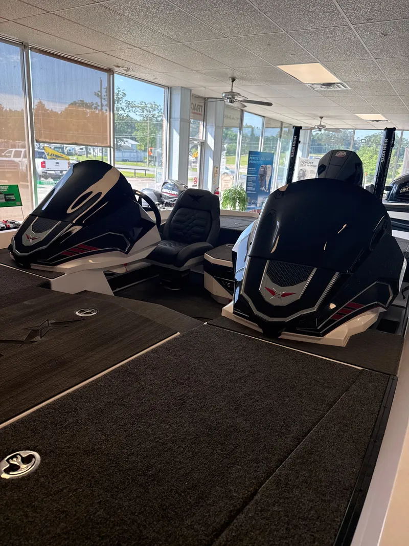 Slide: The Image of 2025 Vexus VXs21 boats displayed in showroom. - 27