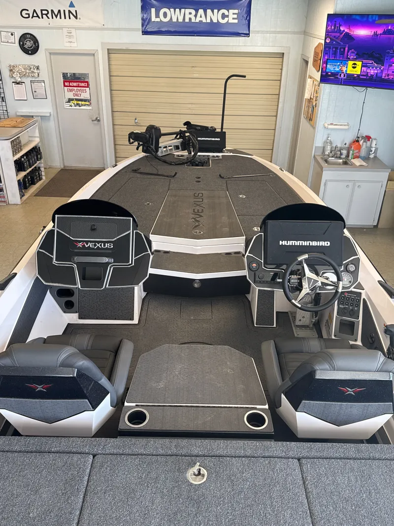 Slide: The Image of Interior view of 2025 Vexus VXs21 boat with modern electronics. - 29