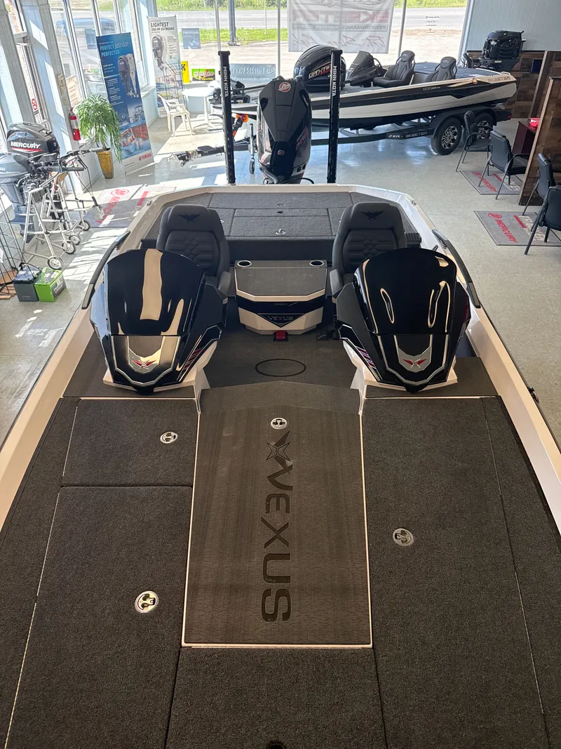 Slide: The Image of 2025 Vexus VXs21 boat in showroom, interior view. - 30