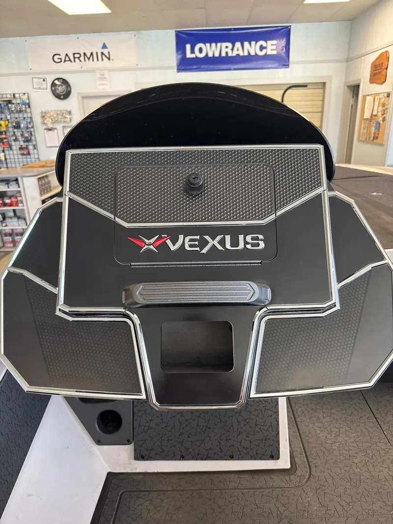 Slide: The Image of Vexus VXs21 2025 dashboard with Garmin and Lowrance signs. - 37