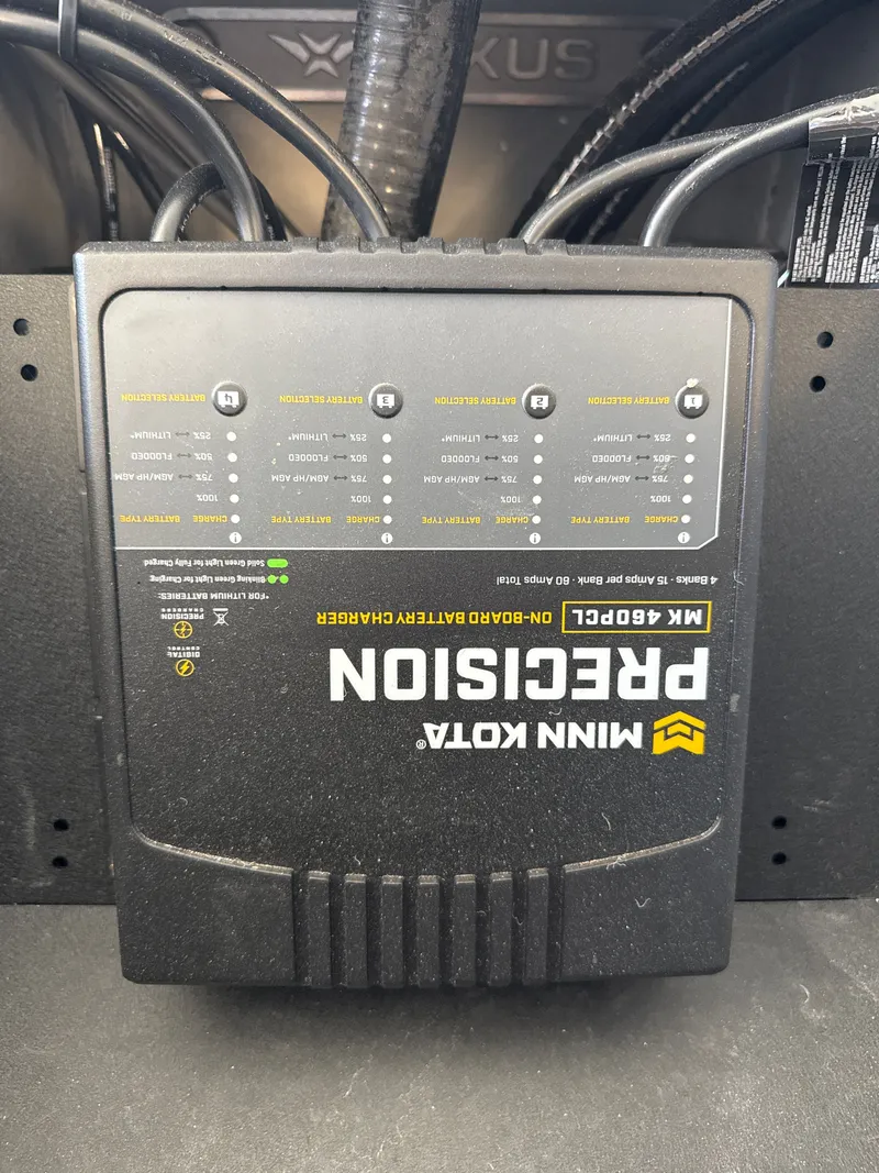 Slide: The Image of Minn Kota precision charger in Vexus VXs21 boat, model 2025. - 44