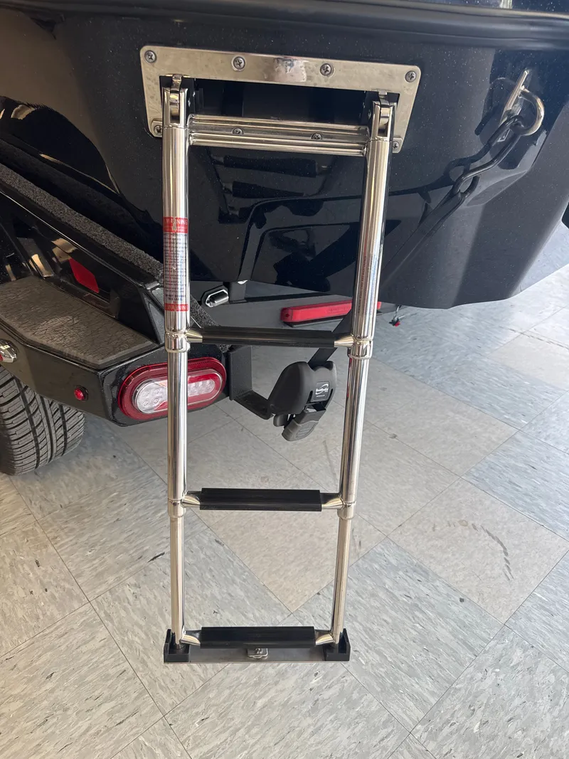 Slide: The Image of Vexus VXs21 2025 boat with retractable ladder. - 45