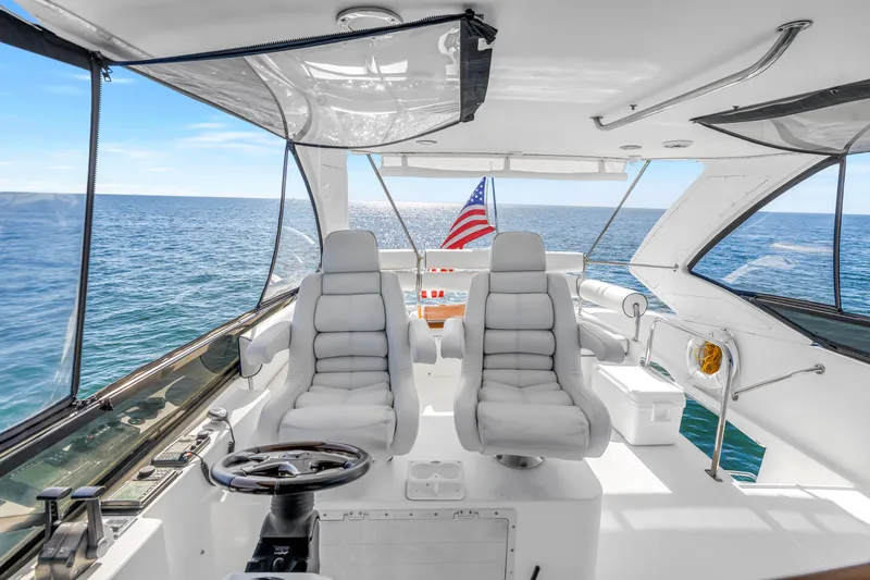 Slide: The Image of Luxurious Neptunus 56 Flybridge yacht interior with ocean view, 2001 model. - 32