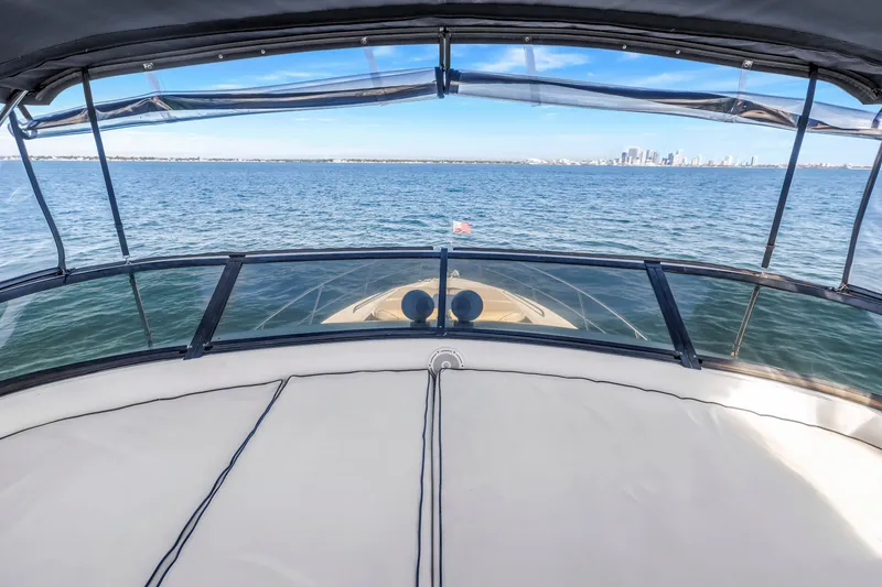 Slide: The Image of Flybridge view from 2001 Neptunus 56 yacht overlooking ocean and distant city skyline. - 36