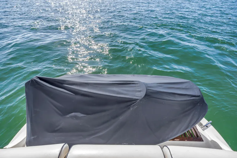 Slide: The Image of Covered equipment on Neptunus 56 Flybridge yacht, 2001, with sparkling water backdrop. - 38
