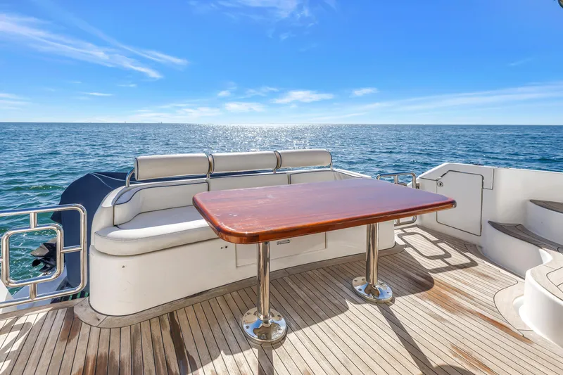 Slide: The Image of Flybridge deck of 2001 Neptunus 56 yacht with ocean view and seating area. - 43