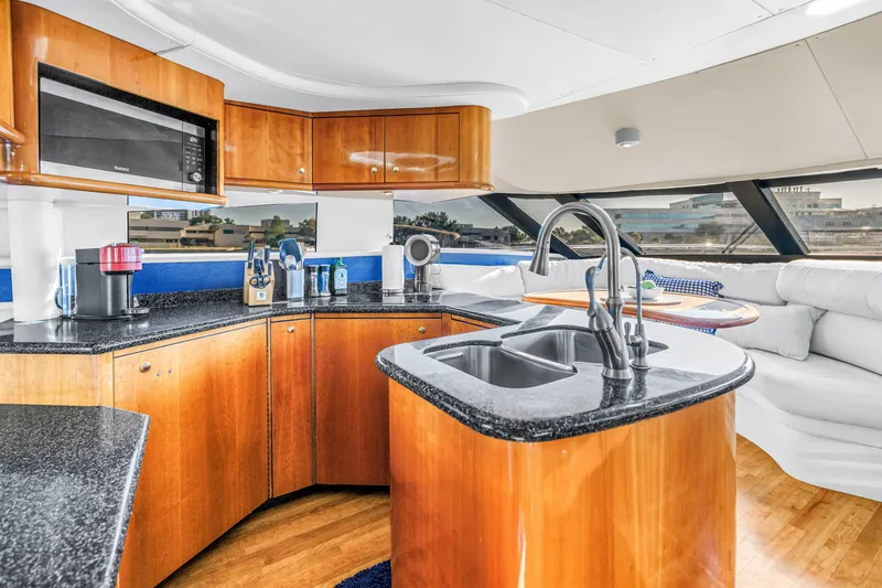 Slide: The Image of Luxurious kitchen interior of 2001 Neptunus 56 Flybridge yacht with modern amenities. - 61