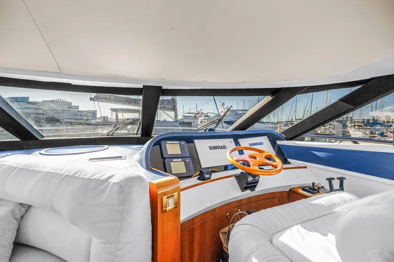 Slide: The Image of Helm of 2001 Neptunus 56 Flybridge yacht with Simrad navigation system. - 66