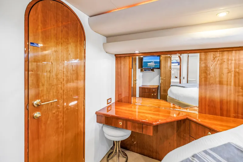 Slide: The Image of Luxurious cabin interior of 2001 Neptunus 56 Flybridge yacht with wooden furnishings. - 71