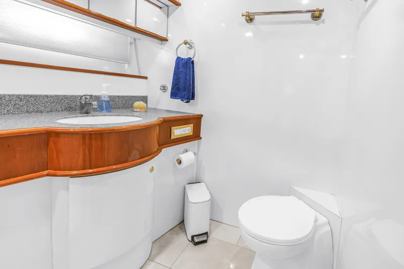 Slide: The Image of Luxurious bathroom in 2001 Neptunus 56 Flybridge yacht with modern fixtures and elegant design. - 79