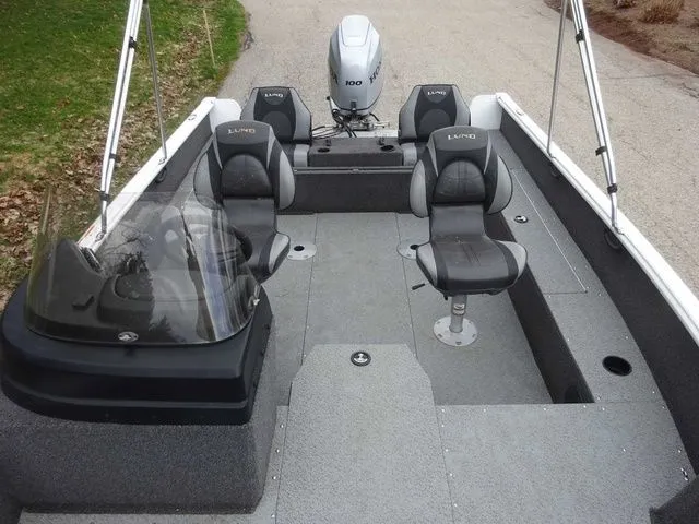 Slide: The Image of Interior view of a 2020 Lund 1775 Impact SS boat with four seats. - 12