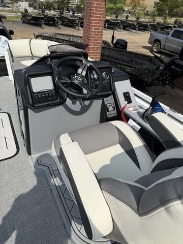 Slide: The Image of Interior of a 2026 Veranda Vr235rcp boat with modern helm station. - 25