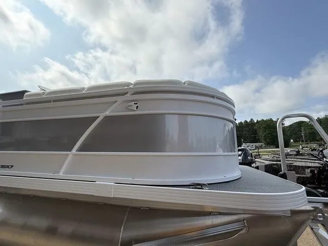 Slide: The Image of 2026 Veranda Vr235rcp pontoon boat under sunny skies. - 5