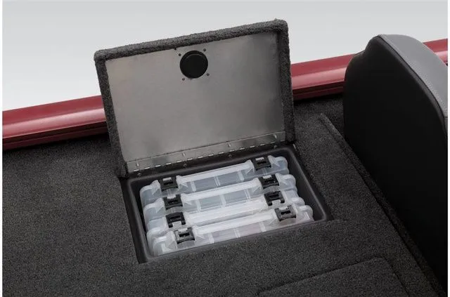 Slide: The Image of 2021 Tracker Pro Team 190 TX storage compartment with plastic boxes. - 30