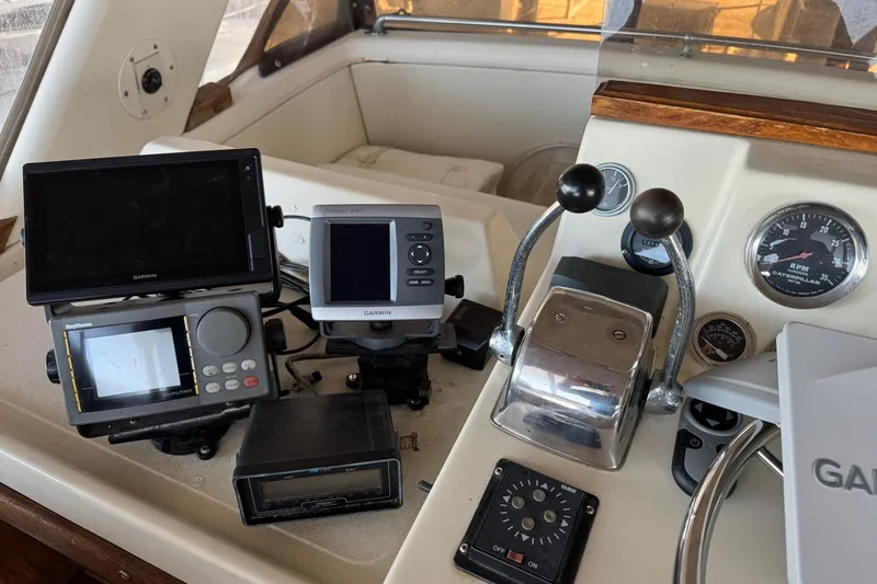 Slide: The Image of 1978 Viking 43 Aft Cabin helm with navigation equipment and controls. - 4