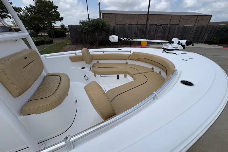 Slide: The Image of 2021 Sportsman Heritage 211 Center Console boat with tan seating and spacious deck. - 6