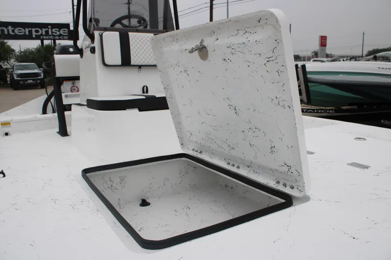 Slide: The Image of Open storage compartment on 2026 Freedom Boats 16' Eagle deck. - 5