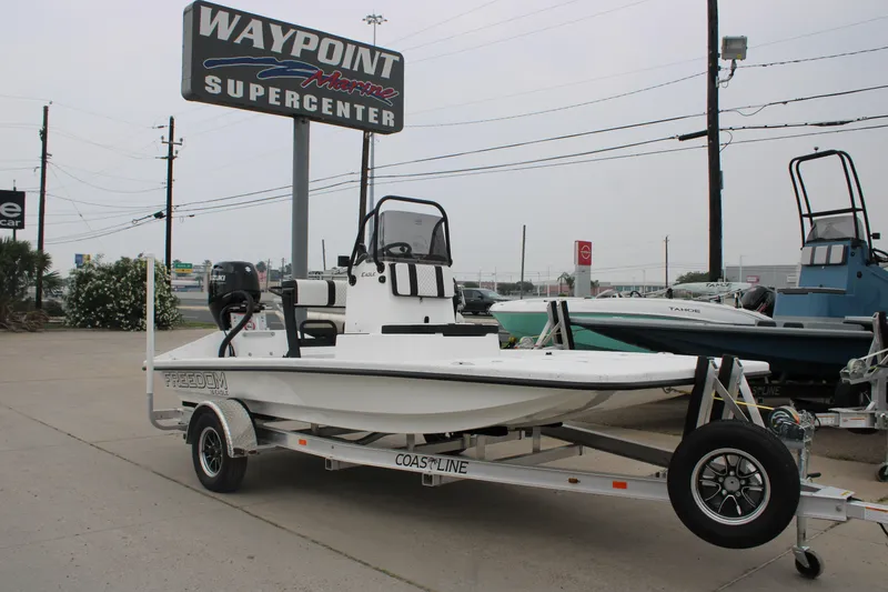 Slide: The Image of 2026 Freedom Boats 16' Eagle on trailer at Waypoint Marine Supercenter. - 9