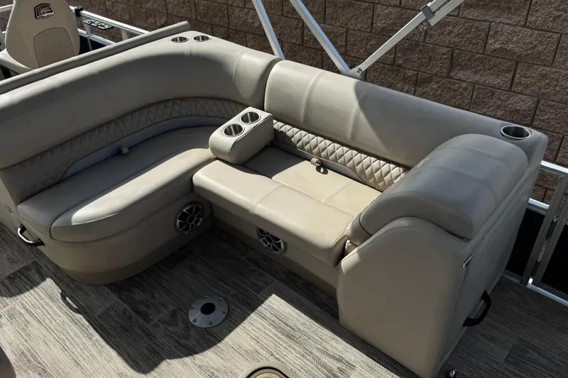 Slide: The Image of Luxurious seating on 2024 Ranger Reata 223F boat with cup holders and stylish upholstery. - 17