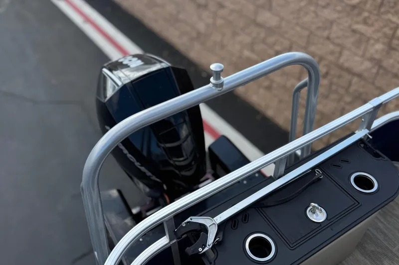 Slide: The Image of 2024 Ranger Reata 223F boat with Mercury outboard motor, rear view. - 23