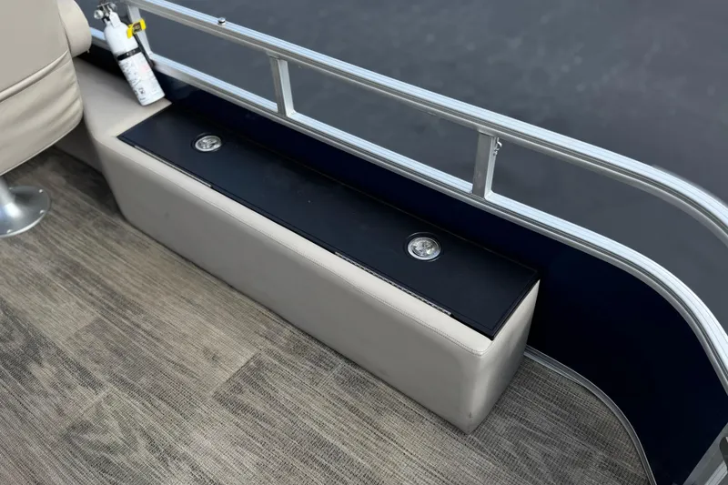 Slide: The Image of 2024 Ranger Reata 223F boat interior with seating, storage, and safety equipment. - 24