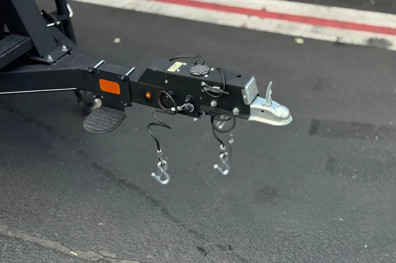 Slide: The Image of Trailer hitch of 2024 Ranger Reata 223F on asphalt surface. - 35