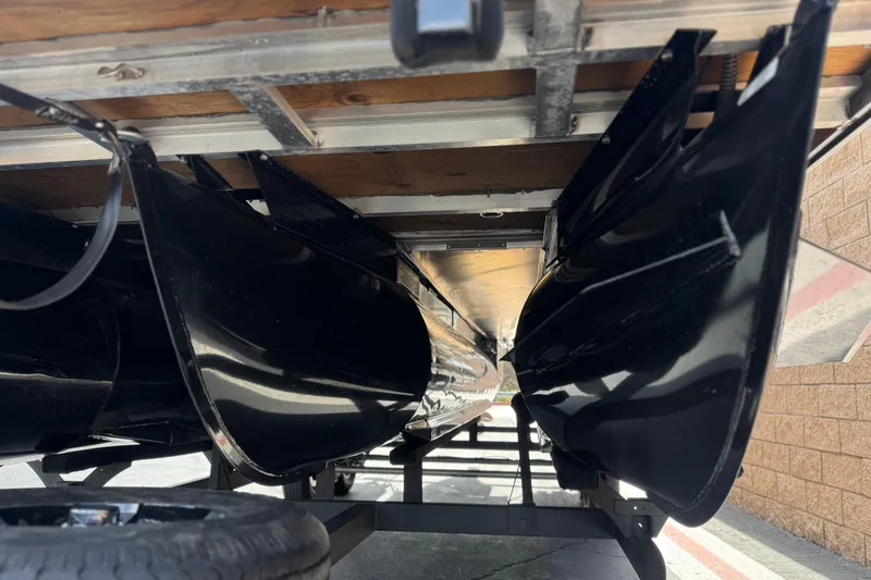 Slide: The Image of Underneath view of 2024 Ranger Reata 223F boat hull on trailer. - 4