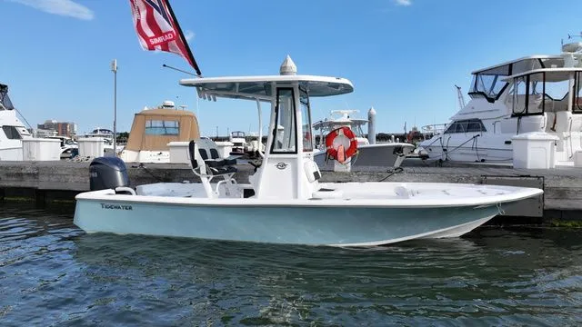 The Image of 2026 Tidewater 2210 Carolina Bay boat docked at marina. - 1
